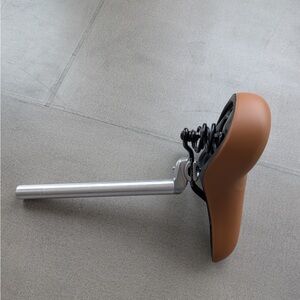 Brown Bicycle Seat with Silver Post